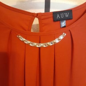 Red blouse with gold chain size M